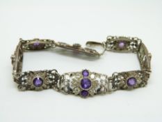 Arts and Crafts silver bracelet set with diamonds and amethysts in stylised floral design