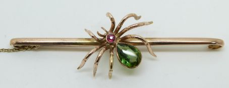 Edwardian brooch in the form of a spider set with a pear cut tourmaline and a ruby, 7.5g, 7.9g