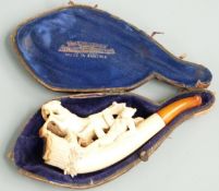 A carved Meerschaum pipe depicting a horse and fallen jockey, in original Austrian case, L12cm