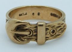 A 9ct gold buckle ring, 4.7g, size M