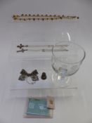 A silver filigree brooch, two silver pendants set with garnets, cloisonné thimble etc