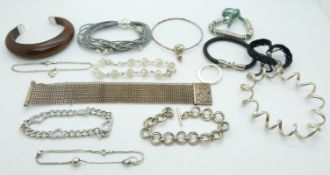 A collection of silver bracelets and bangles