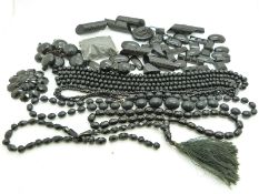 A strand of Chinese prayer beads, French jet beads and brooch, Vauxhall glass etc