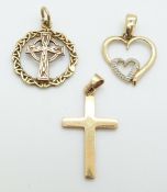 Three 9ct gold pendants, 3.9g