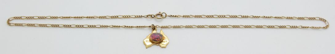 A 9ct gold pendant depicting Australia on a 9ct gold chain, 3.9g