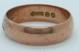A 9ct rose gold wedding band/ring, London 1917, 5g, size R/S
