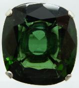 A platinum ring set with a large cushion cut tourmaline measuring approximately 22.6ct and