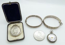 Two silver bangles, silver fob watch, silver crown and a commemorative coin