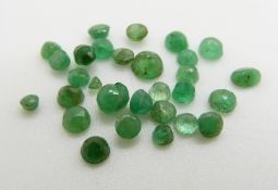 Twenty seven round cut loose emeralds of South Colombian origin