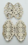 Two Edwardian hallmarked silver belt buckles, both with pierced decoration and Birmingham 1901,