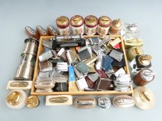 A large collection of lighters including Ronson, Dunhill and Colibri