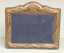 Modern hallmarked silver photograph frame to suit 7 x 5 inch photo, with velvet easel back,