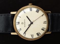 Rodania 9ct gold gentleman's wristwatch with black hands and Roman numerals, cream dial and 17 jewel