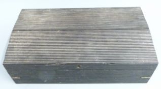 19th/early 20thC ebony writing slope with fitted stationery dividers and ribbed exterior, W42cm