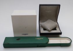 Two Longines wristwatch boxes one with outer card box.