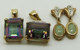 Two 9ct gold pendants set with mystic topaz and two yellow metal pendants set with a quartz cabochon