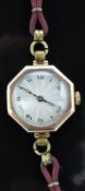 Rolex 9ct gold ladies wristwatch with black hands and Roman numerals, silver dial, octagonal case