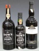 Three bottles of Dow's Vintage Port, comprising Dows 1963 Vintage Port, Dows 1980 half bottle,