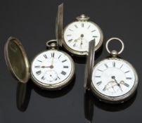 Three silver open faced pocket watches all with subsidiary seconds dials, gold hands, black Roman