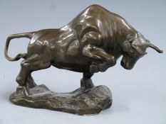 Bronze figure of a charging bull, unsigned, L25 H16cm