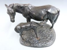 Russian cast iron figure of mare and foal with impressed marks to base, dated 1973, H30.5cm