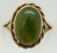 A 9ct gold ring set with nephrite jade cabochon, 4.1g, size P