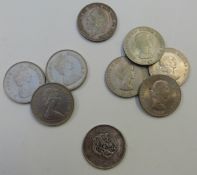 A collection of crown sized coins including 1935 rocking horse example