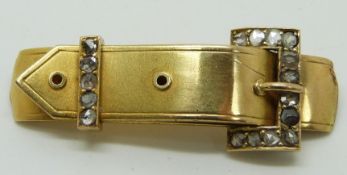 Victorian yellow metal buckle brooch set with rose cut diamonds, 4.2 x 1.4cm