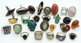 A collection of over 20 silver rings including examples set with moonstone, amber, Blue John, cameo,