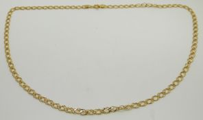A 9ct gold necklace with faceted mesh links, 5.4g