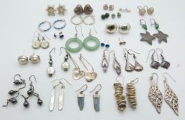 A quantity of silver earrings including pearl, amethyst etc