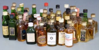 Approximately 52 whisky miniatures including Chivas Regal blended, Crawfords Special Reserve,