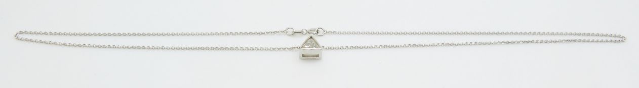 An 18ct white gold pendant set with a trillion cut diamond of approximately 0.35ct