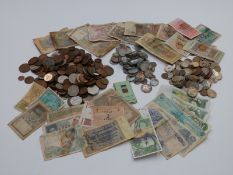 A collection of UK and overseas coinage and banknotes
