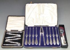 Walker and Hall cased set of shellfish picks, cased nutcracker set and a bottle opener etc