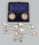 Cased pair of Edward VII hallmarked silver salts with embossed decoration, Birmingham 1901 maker