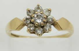 A 9ct gold ring set with paste in a cluster, 1.7g, size Q