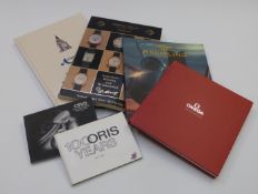 Fifity-seven various wristwatch catalogues and publications including Rolex, Omega, IWC,