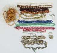 A collection of costume jewellery including paste brooch, beads, paste necklace etc