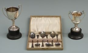Cased set of six hallmarked silver teaspoons together with two hallmarked silver twin handled trophy