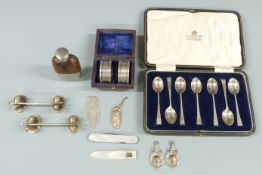 Pair of hallmarked silver napkin rings in case, silver and mother of pearl bookmarks, plated figural