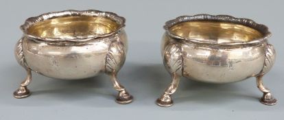 Pair of Victorian hallmarked silver open salts, with shaped rims and raised on pad feet, London 1870