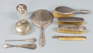 Hallmarked silver dressing table items comprising hand mirror and three various brushes,