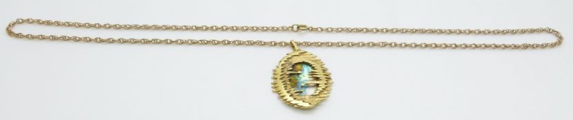 A yellow metal chain/ necklace with a gold plated pendant set with abalone, 8.3g