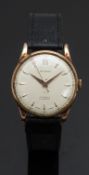 Bucherer gentleman’s wristwatch  with gold hands and hour markers, silver dial, gold plated case and
