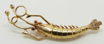 A yellow metal brooch in the form of a lobster set with rubies and diamonds, marked 585, 4.2g
