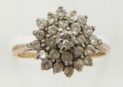 A 9ct gold ring set with a cluster of diamonds, 2.3g, size L/M