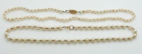 Two cultured pearl necklaces with 9ct gold clasps