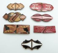 Seven Art Deco enamel buckles