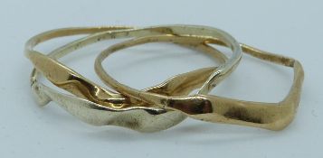 A 9ct gold puzzle ring, 2.9g, size W/X